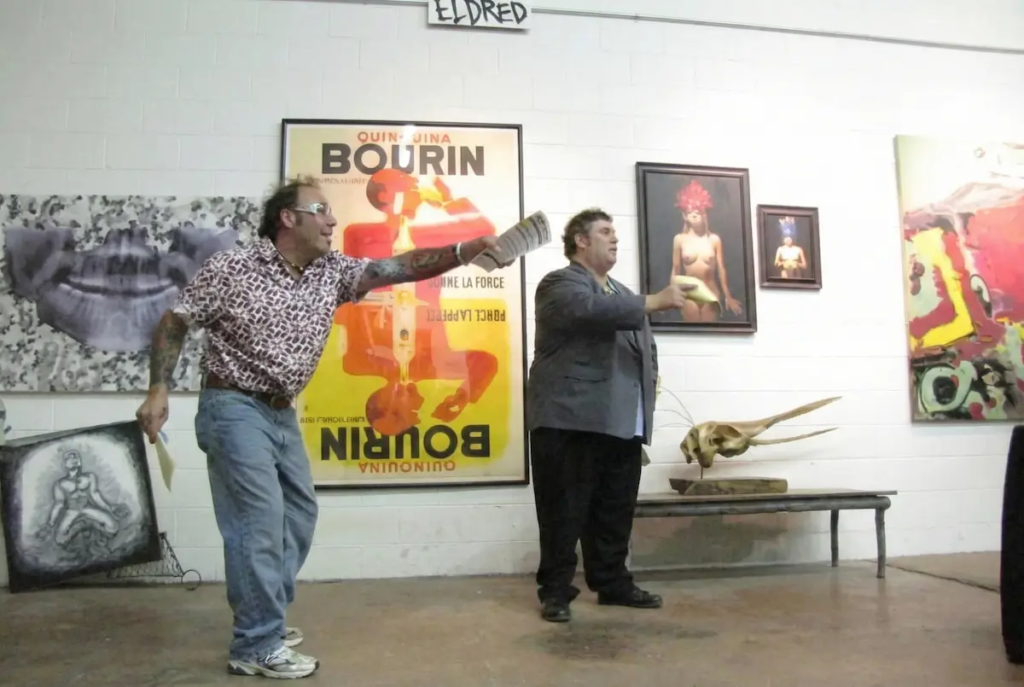 Todd Weiner and gallery co-owner at Art Bidz auction featuring Christian Valverde artwork, Kansas City, 2009